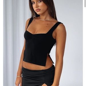 White fox Taking Off Top Black